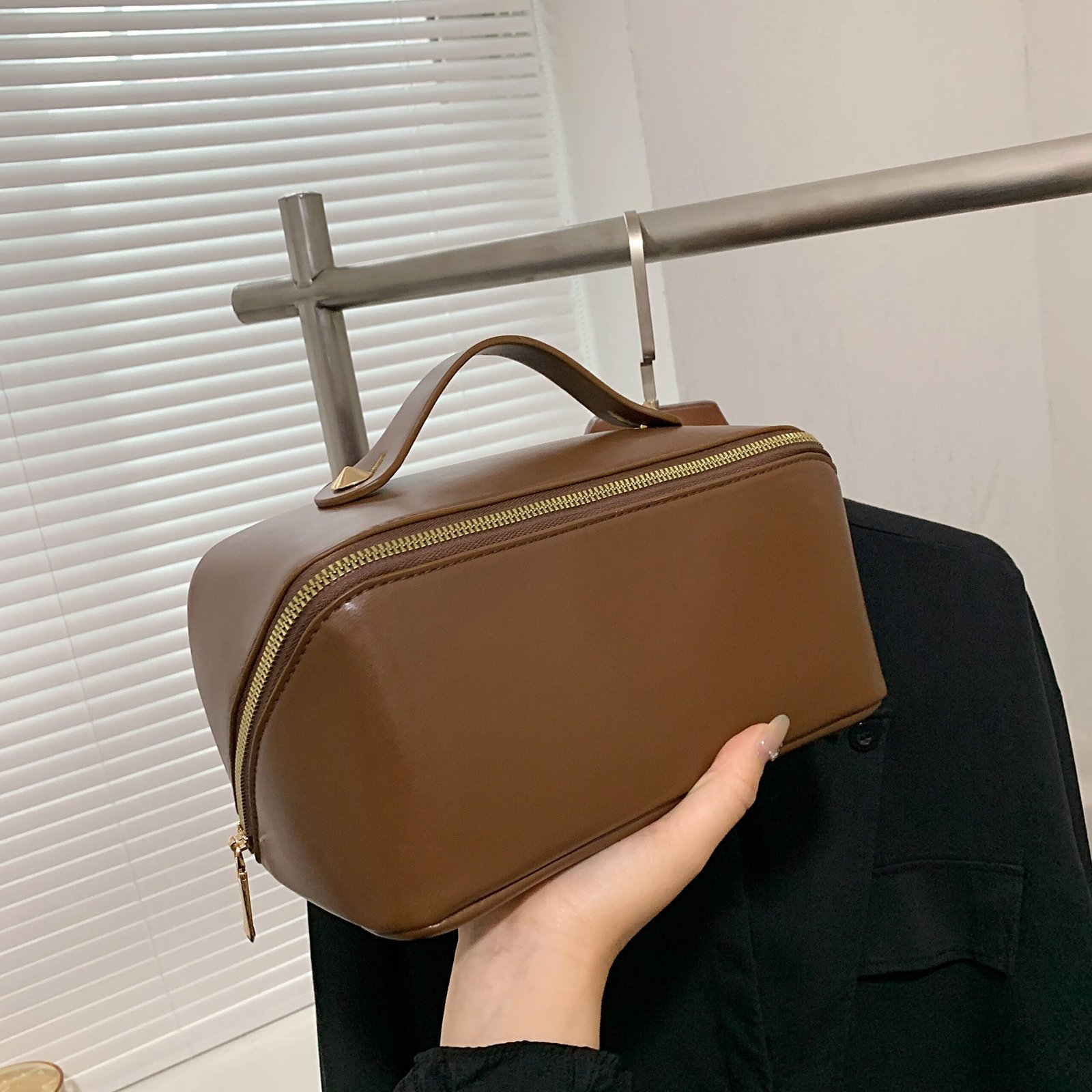 gold-tone hardware pouch